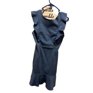 Denim sleeveless mini dress with ruffled bottom.